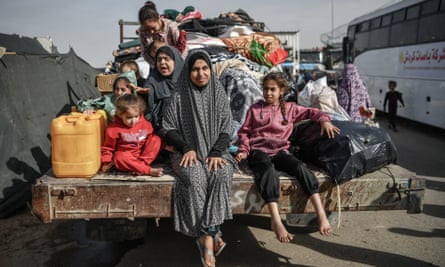 A family displaced from Nuseirat due to Israeli strikes on their way to Rafah