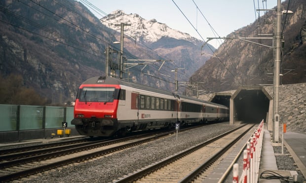 A passenger train enters the south portal of the GBT on Sunday. Photograph: Samuel Golay/EPA  A passenger train enters the south portal of the GBT on Sunday. Photograph: Samuel Golay/EPA