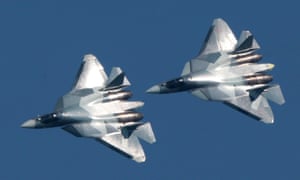 Sukhoi Su-57 jet fighters fly over at an air display event near Moscow in August 2017.