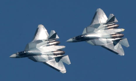 Sukhoi Su-57 jet fighters fly over at an air display event near Moscow in August 2017. 