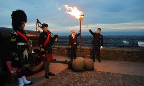 Army cadets Ciaran Cook, Callum Lowther, Edinburgh’s Lord Provost Robert Aldridge and the commander of Edinburgh Garrison, Lt Col Lorne Campbell, attend the beacon lighting at Edinburgh Castle, 2 June.