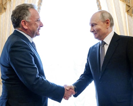 Steve Witkoff and Vladimir Putin shake hands during a meeting at the Constantine Palace in St Petersburg.