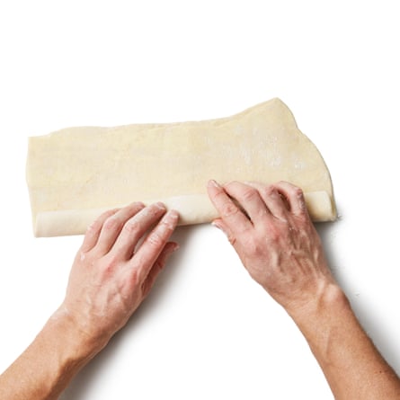 Felicity Cloake’s pastel de nata 05c. Roll out for a final time to a ½cm-thick rectangle that’s about 20cm x 35cm. With the long side facing you, roll up very tightly into a long sausage and wrap well (you may find it easier to cut this in two, and wrap like that). Chill for at least an hour.