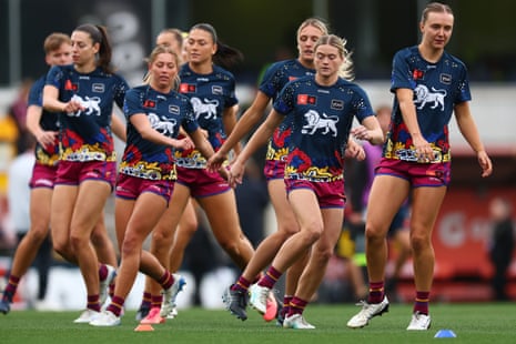 The Lions warm up ahead of the AFLW grand final