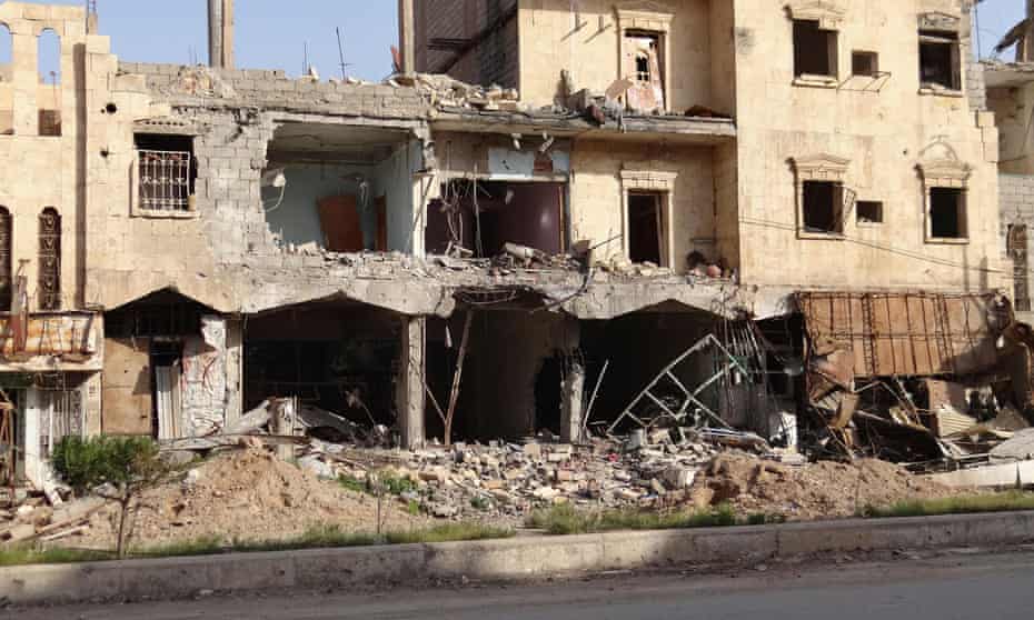 A view of damaged shops in Deir ez-Zor, taken in April 2014.
