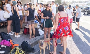 Sydneysiders at a cafe at Bondi beach on Wednesday. Restrictions have eased further in NSW today.