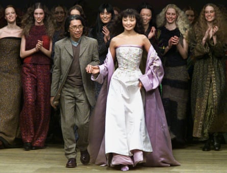Kenzo takes to the catwalk with a model wearing a bridal gown at the end of his 1999/2000 autumn/winter ready-to-wear fashion show.