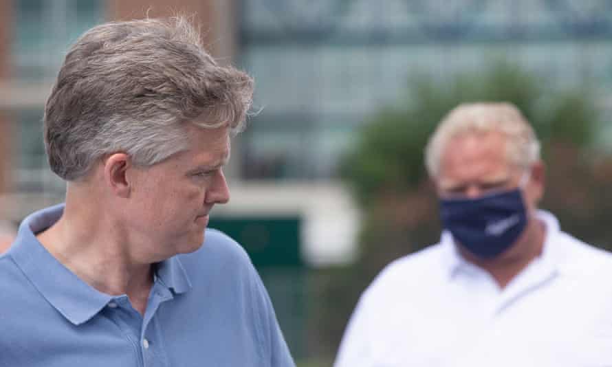 Rod Phillips, with the Ontario premier, Doug Ford, who admitted he had known that his finance minister was in the Caribbean.