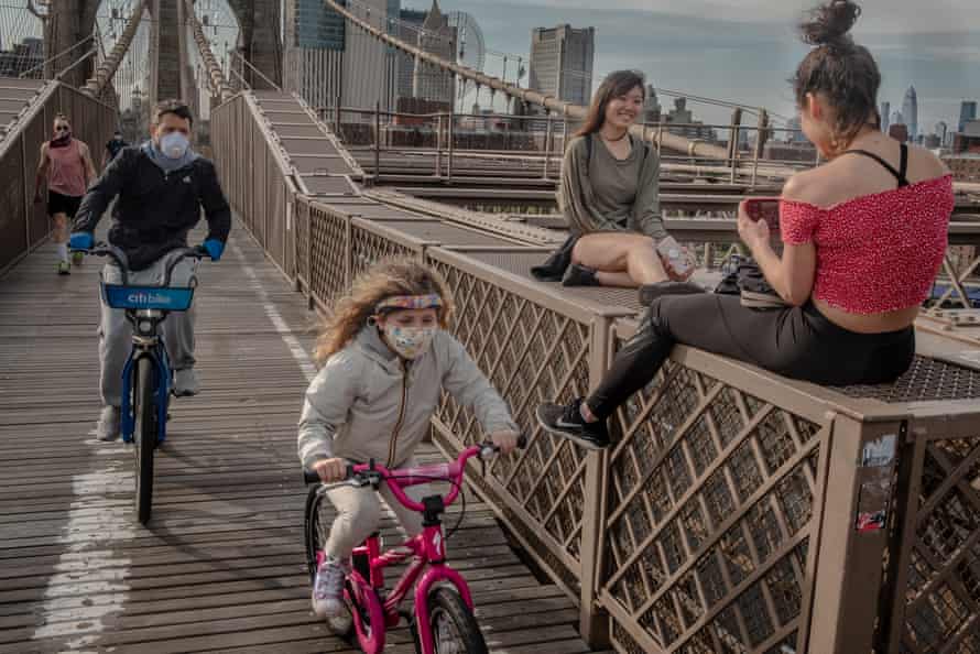 Bike rides and selfies on the Brooklyn, Bridge in Brooklyn, New York on Monday, May 18th.