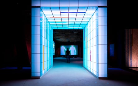 Man silhouetted in a square archway of light in the interactive digital storytelling feature, Gateway to the Future, in the John Randle Centre
