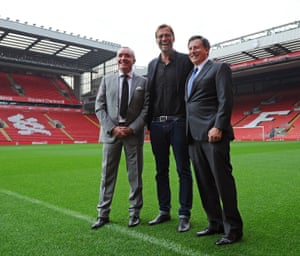 Jürgen Klopp with Tom Werner, right, and Ian Ayre at Anfield after his unveiling.