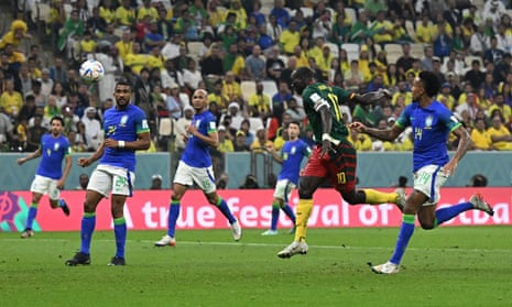 Cameroon’s Vincent Aboubakar plants his header.