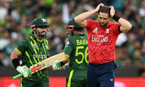 England’s Chris Woakes (right) reacts as Pakistan’s Muhammad Rizwan (left) and Babar Azam run between the wickets.