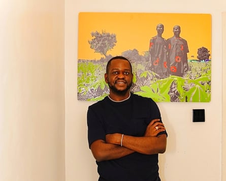 A man stands in an art gallery