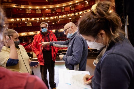 Richard Jones (Director) with Rosy (Stage Manager, left) and Matthew Rose (Wotan, red jacket).