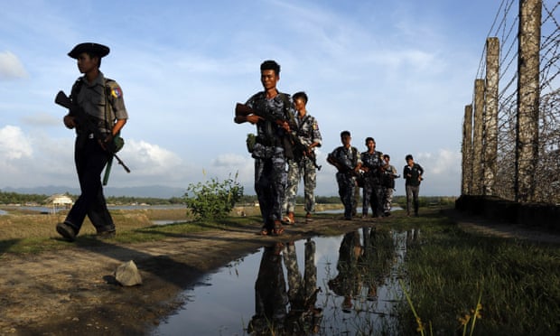 Myanmar police officers patrol the border between Myanmar and Bangladesh in Maungdaw, Rakhine State, in this photo from October.