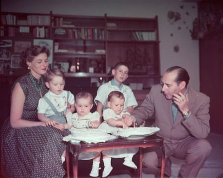 Rossellini, Bergman and the children gather around a birthday cake