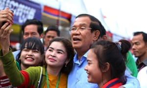 Cambodian prime minister Hun Sen (centre) is seeking re-election as his government cracks down on âfake newsâ.