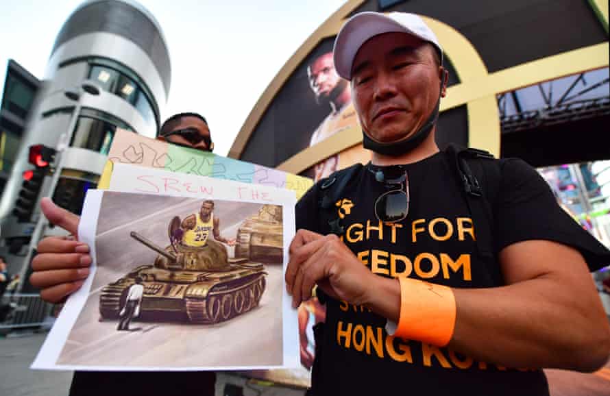 Anti-Chinese Communist Party activists protest outside Staples Center, home of the LA Lakers and Clippers, in the wake of the NBA’s confrontation with China
