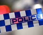 Man shot dead by NSW police after reportedly breaking into house with knife and chainsaw and stabbing woman