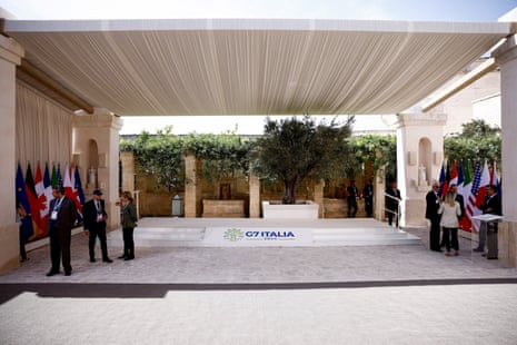 People wait for the arrival of leaders at the Borgo Egnazia resort.