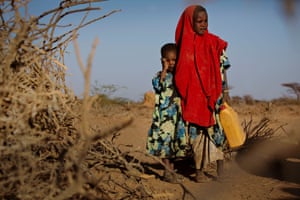 Tirig and her sister Saua in Somalia. Their family was forced to leave their home in search of water and food.