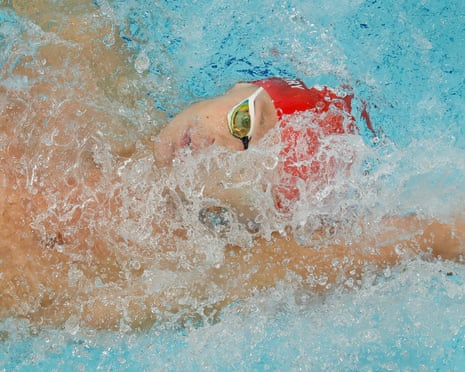 Jack Skerry of England competes in the heats of the men's 100m backstroke.