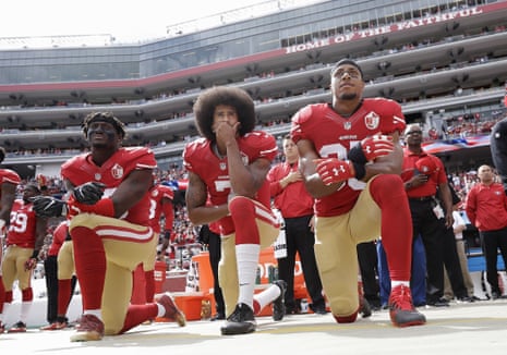 San Francisco 49ers outside linebacker Eli Harold, quarterback Colin Kaepernick and safety Eric Reid kneel during the national anthem before an NFL football game against the Dallas Cowboys in Santa Clara, California, October 2 2016