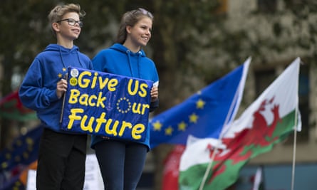 Children hold a pro-EU sign at a rally in Cardiff