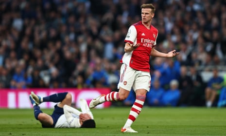 Rob Holding of Arsenal is shown a second yellow card for a challenge on Son Heung-min of Tottenham Hotspur.