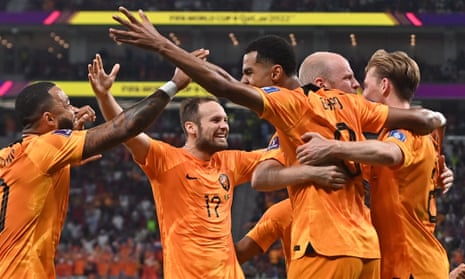 Cody Gakpo (centre) receives a loving embrace after scoring the Netherlands’ winner over Senegal