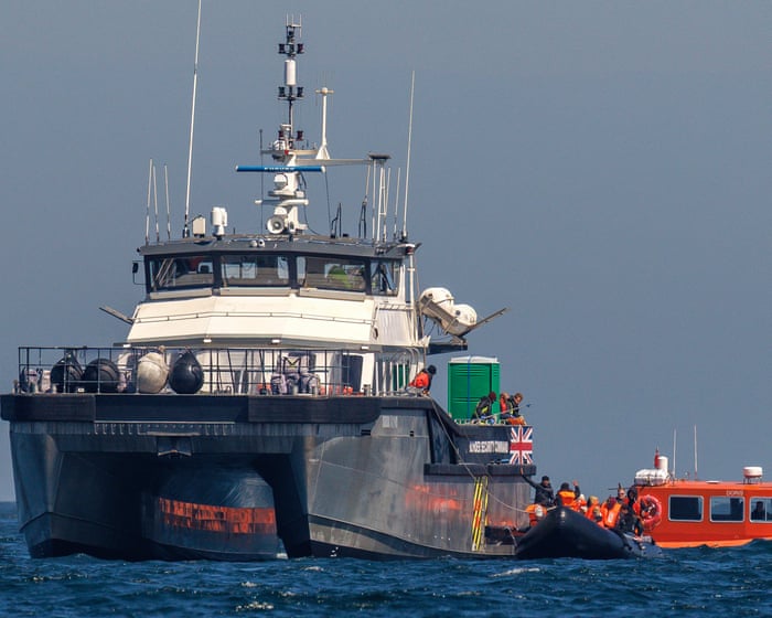 Dinghy carrying 157 people capsizes in Channel after engine catches fire — image supplied by The Guardian UK's feed