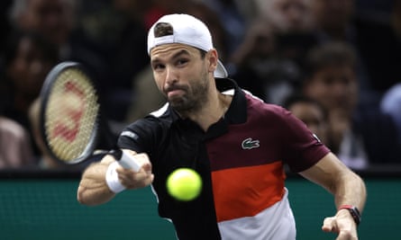 Grigor Dimitrov plays a shot against Stefanos Tsitsipas.