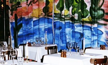 The dining room at Sessions Arts Club decorated with a curtain featuring Faye Toogood’s Spirit of Eden design