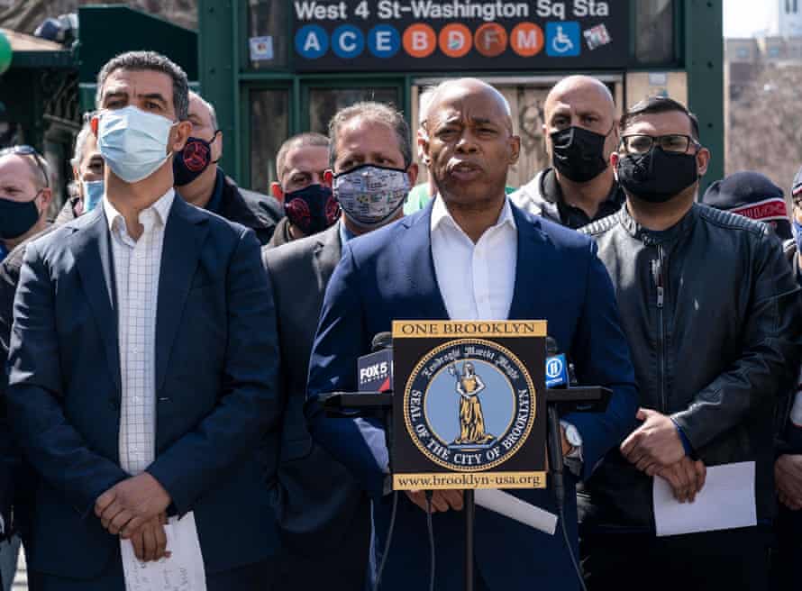 Mayoral candidate Eric Adams, center, accused Yang of abandoning New York City at ‘its darkest moment’.