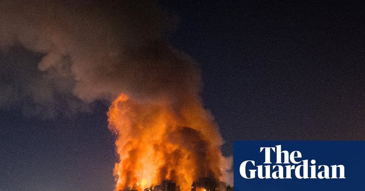 Hong Kong’s leader apologises for residential fire that killed 168 people