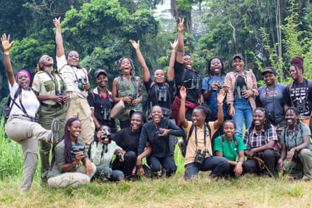 Members of the Uganda Women Birders Club pose for a photo after an excursion at the Botanical gardens.