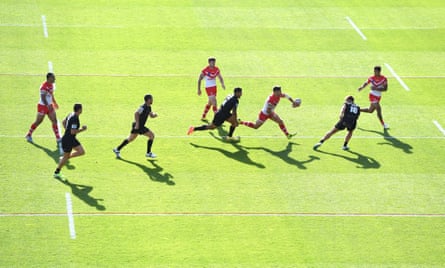 Catalans Dragons in action against St Helens.