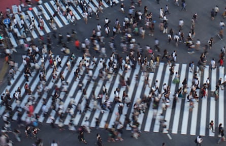 People crossing an intersection in Tokyo’s shopping district Shibuya
