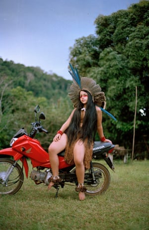 Sthefany and the motorbike, Bahia, Brasil (from the winning Series: The Tupinambás, Serra do Padeiro)Sthefany Tupinambá defies her size. Although a petite girl, she is known for her strong temperament and ideas and is currently studying medicine at the prestigious federal university of Bahia. For many centuries, the Tupinambá ethnicity was considered extinct, due to their contact with Europeans, who decimated them and their culture. But in recent times, people from the indigenous community of Serra do Padeiro, south of Bahia, Brazil, were able to claim back their rightful title and land