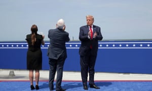 Donald Trump, Mike Pence and his wife Karen Pence applaud after the launch of a SpaceX Falcon 9 rocket.