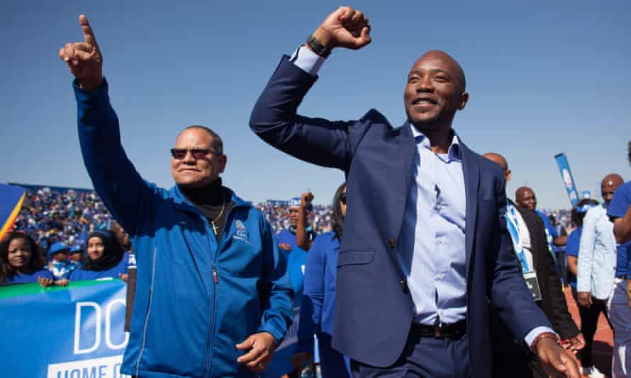 Mmusi Maimane (right), at a rally with thousands of people in Soweto, South Africa, July 2016.