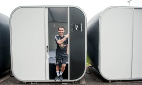 Leon Britton stands in his ‘Snoozebox’ at Swansea’s training ground. The club has installed 30 of them for players to sleep in between sessions.
