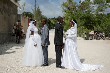 Two pregnant couples, unknown to each other, marry in a joint ceremony to share the wedding in Baie de Henne, Nord Ouest department