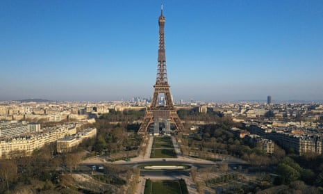 A deserted Champs de Mars and Eiffel Tower in Paris, 2 April 2020.