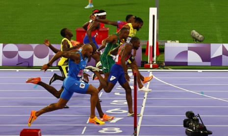 Noah Lyles of United States crosses the line to win gold in the men’s 100m final by five thousandths of a second.