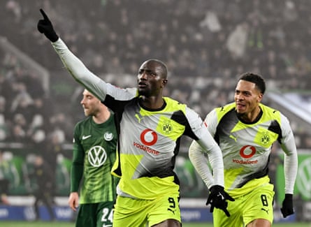 Serhou Guirassy celebrates scoring their second goal with Felix Nmecha