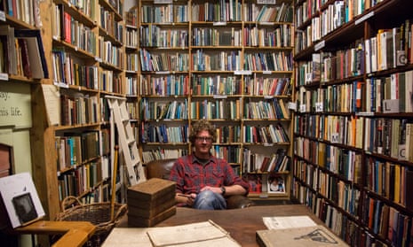 ‘This is a man who shot a Kindle and wall-mounted it’: Shaun Bythell in his Wigtown bookshop