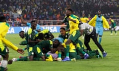 Senegal players celebrate winning the penalty shoot.