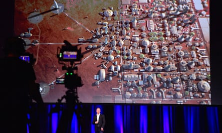 Elon Musk, founder of SpaceX, shows a depiction of a human colony on Mars.